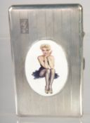 A GOOD LARGE HEAVY ENGINE TURNED CIGARETTE CASE with and oval enamel of a glamour girl. 5.5ins x 3.5