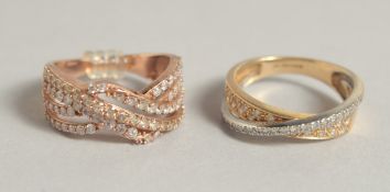 TWO GOLD AND DIAMOND RINGS.