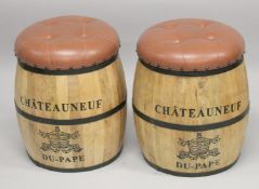 A PAIR OF WOODEN BARREL SEATS with padded leather top.