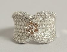 AN 18CT WHITE GOLD DIAMOND BAND RING approx. 200 diamonds, 4 carats, of brilliant and fancy cut