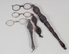 THREE PAIRS OF PIERCED OR CARVED VICTORIAN TORTOISESHELL LORGNETTES.