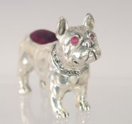 A SILVER PLATED BULL DOG PIN CUSHION. 2.5ins long.