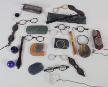 A TRAY OF VARIOUS SPECTACLES AND CASES.