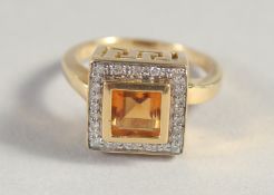 AN 18CT YELLOW GOLD CITRINE AND DIAMOND RING.