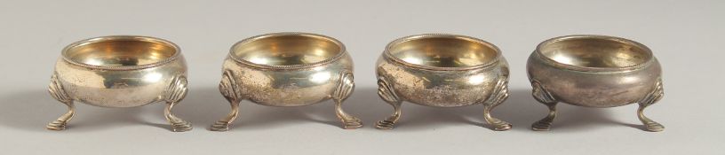 A CASED SET OF FOUR SILVER CIRCULAR SALTS. Birmingham, 1911.