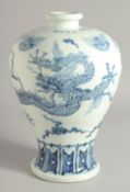 A CHINESE BLUE AND WHITE PORCELAIN MEIPING VASE decorated with a large dragon and lion masks, four