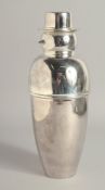 A SILVER PLATED SNOWMAN COCKTAIL SHAKER.