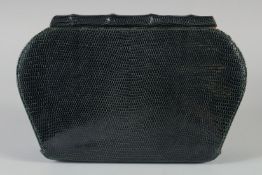 A GUCCI BOTTLE GREEN CLUTCH BAG snake or crocodile skin with rustic handles. 26cm long, 16cm high