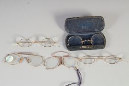 FIVE PAIRS OF EDWARDIAN GILT SPECTACLES.