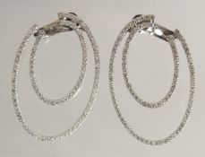 A VERY GOOD PAIR OF 18CT WHITE GOLD AND DIAMOND SET DOUBLE LOOP EARRINGS.