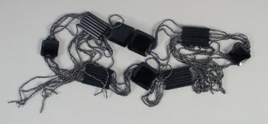 AN EDWARDIAN JET BELT with cut steel, circa. 1910. 33ins long, 125 gms.