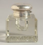 A LARGE SQUARE GLASS INKWELL with silver top. 3.75ins wide, Birmingham 1942.