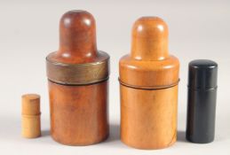FOUR VARIOUS TREEN AND EBONY BOX WOOD CASED PHIALS, 5.5ins, 5ins, 3.5ins & 1.75ins high.