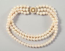 A THREE ROW PEARL NECKLACE AND CLASP set in 9ct gold.