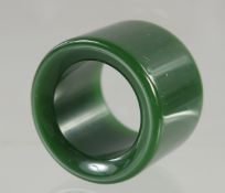 A JADE ARCHER'S RING.