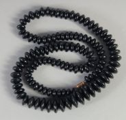 A VICTORIAN JET, Circa. 1880, GRADUATED BEAD NECKLACE. 28ins long, 65gms.