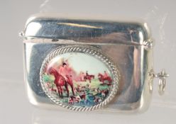 A SMALL SILVER VESTA 