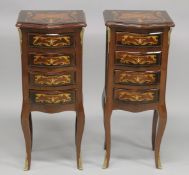 A PAIR OF FRENCH STYLE MARQUERTY FOUR DRAWER CHESTS. 1ft 1.5ins wide x 12ins deep x 2ft 8ins high.