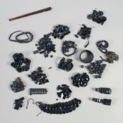 A BOX OF JADE NECKLACES, some need restoring.