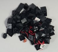 A BAG OF VARIOUS JADE PIECES.