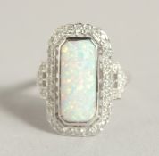 A GOOD 9CT GOLD OPAL AND DIAMOND DECO STYLE RING.