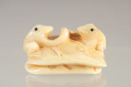 A CARVED BONE FROG NETSUKE. 1.5ins.
