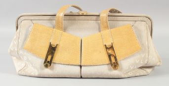 A GOOD BULGARI CREAM LEATHER BAG, two shades, two purses at the front. 44cm long x 20cm high.