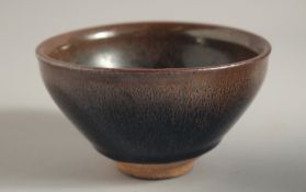 A CHINESE HARE'S FUR GLAZE POTTERY BOWL. 12ins diameter.
