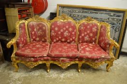 A FRENCH STYLE GILTWOOD SOFA. 7ft long.