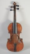 A VIOLIN IN A CASE, two piece back. 23.5ins long.