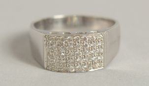 AN 18CT WHITE GOLD DIAMOND BAND RING.
