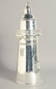 A SILVER PLATED LIGHTHOUSE COCKTAIL SHAKER.