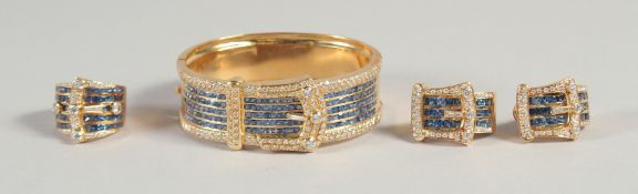 A SUPERB 18CT YELLOW GOLD DIAMOND AND SAPPHIRE SET BUCKLE STYLE BRACELET, EARRINGS AND RING. Approx.