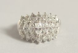 A SUPERB 14CT WHITE GOLD MARQUISE CUT DIAMOND RING.