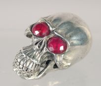 A SILVER PLATED SKULL SNUFF BOX. 1.75ins.