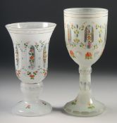 TWO BOHEMIAN GLASS GOBLETS painted with flowers. 8ins & 7ins high.