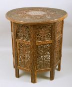 A GOOD MOORISH BONE INLAID CIRCULAR TABLE, carved with two bands of grape and vine and ornate