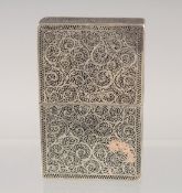 A FINE 19TH CENTURY INDIAN FILIGREE SILVER CARD CASE, 8cm x 5cm.