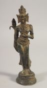 A BRONZE BUDDHISTIC FIGURE, 19.5cm high.
