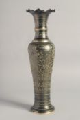 A FINE INDIAN METAL VASE, with engraved decoration, 40.5cm high.