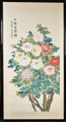 A LARGE CHINESE PAINTING OF FLOWERS, inscribed and with red seal mark, framed and glazed, image