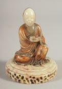 A GOOD CHINESE SOAPSTONE FIGURE AND STAND, figure 9cm high.