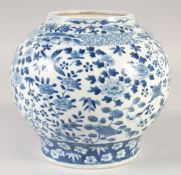 A FINE CHINESE BLUE AND WHITE PORCELAIN JAR, painted with flora and birds, four-character mark to