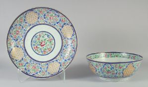 A LARGE QAJAR PORCELAIN BOWL AND PLATE, with decorative foliate motifs, bowl 28.5cm diameter,