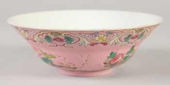 A CHINESE FAMILLE ROSE PORCELAIN BOWL, decorated with flora, the interior with five bats, four-
