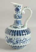A CHINESE BLUE AND WHITE PORCELAIN EWER, with flora and phoenix, incised character mark to base,