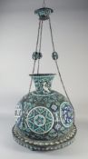 A 19TH CENTURY ISLAMIC ENAMELLED OPENWORK MOSQUE CHANDELIER, with hanging chains, 49cm diameter.