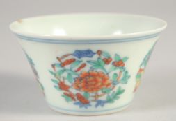 A CHINESE DOUCAI PORCELAIN CUP, six-character mark to base, 7.5cm diameter.