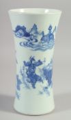 A CHINESE BLUE AND WHITE PORCELAIN SLEEVE VASE, decorated with figures in an outdoor setting, 23.5cm