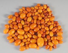 A COLLECTION OF AMBER BEADS, various sizes, (qty).